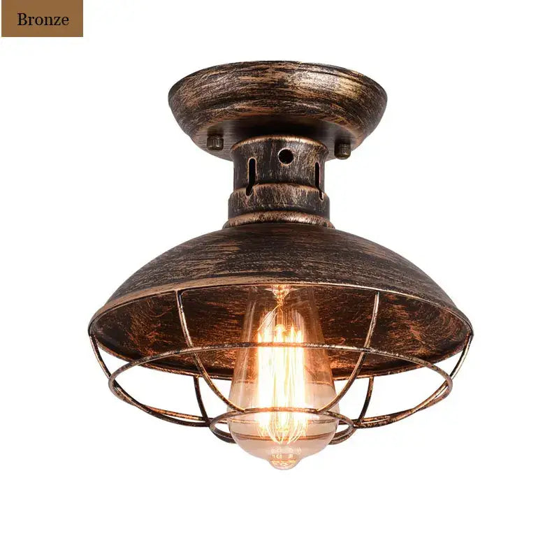 Bronze-finished decorbites industrial ceiling light with weathered metal dome and black cage for bedroom decor