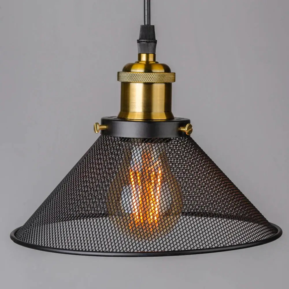 Industrial-style pendant light with black cage mesh shade and brass hardware from decorbites black cage collection