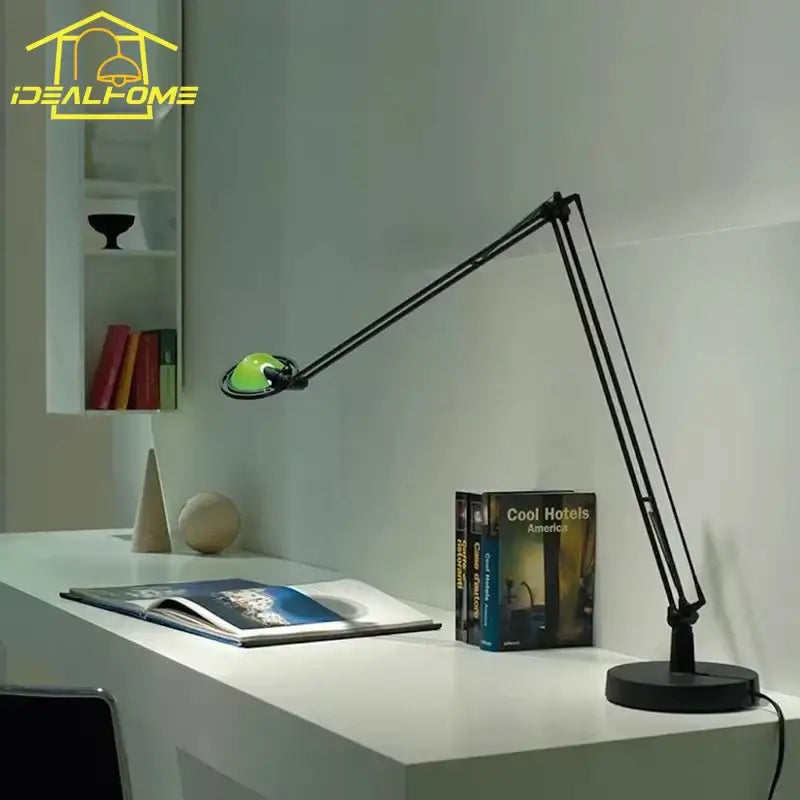 Black articulated desk light with green-tinted circular head industrial black chrome rocker arm decorbites office task lamp