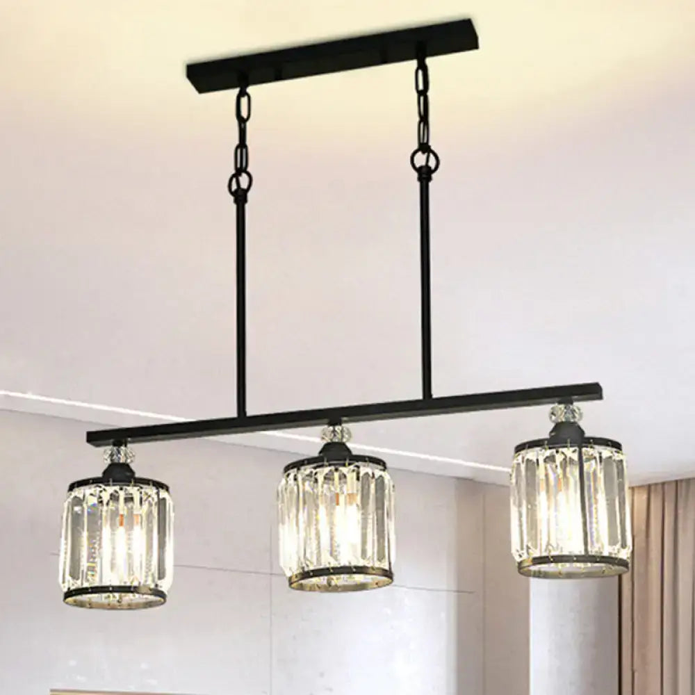Black metal pendant light with three crystal-encased cylinder fixtures for dining room industrial decor