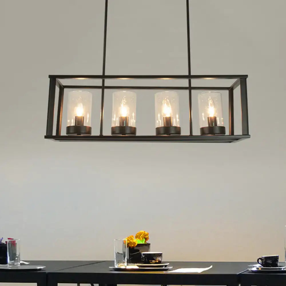 Black metal rectangular pendant light with four clear glass cylinders for kitchen island illumination