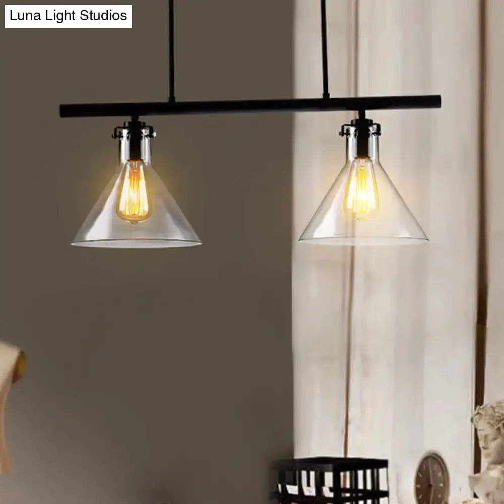 Black metal industrial cone clear glass island lamp with two conical shades and exposed filament bulbs for dining table