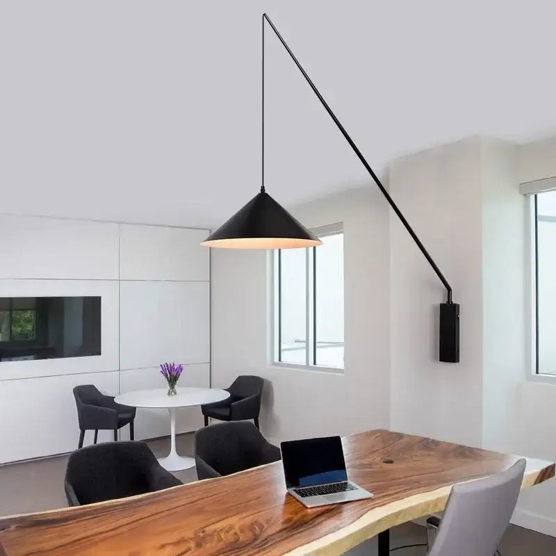 Black conical pendant light with sleek articulated arm and matte finish in decorbites industrial fishing sconce design