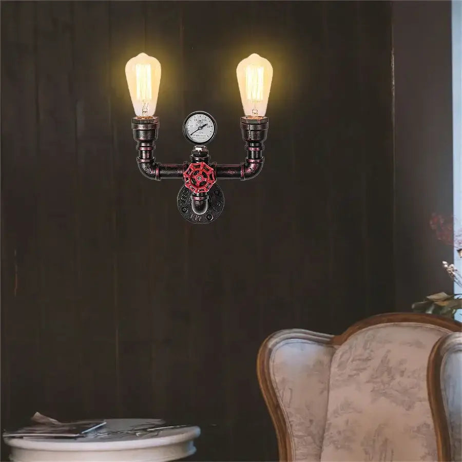 Industrial black and copper steampunk wall sconces with glowing filament bulbs and red valve accents for bathroom decorbites wall lamps