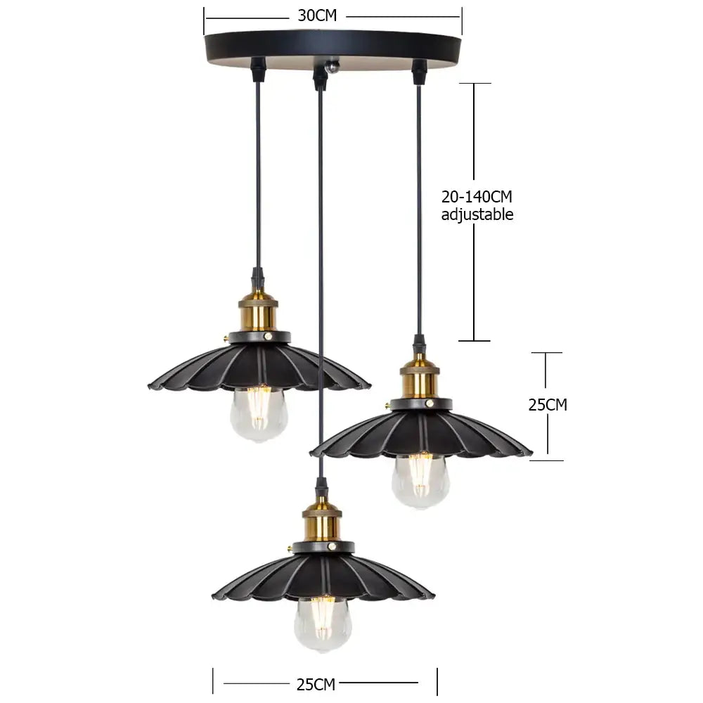 Black metal pendant light with gold-toned accents and scalloped shades from decorbites copper vintage pendant collection