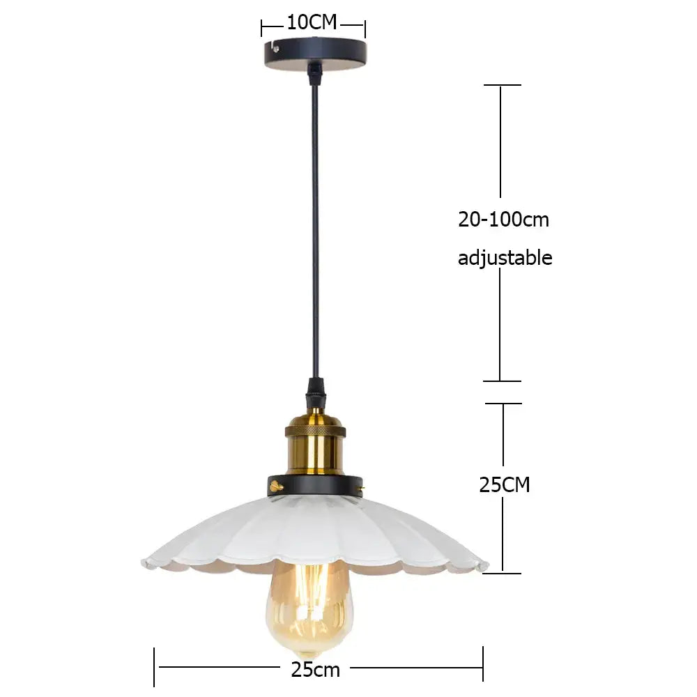 A vintage-style pendant light with white scalloped glass shade and brass accents for decorbites copper vintage decor