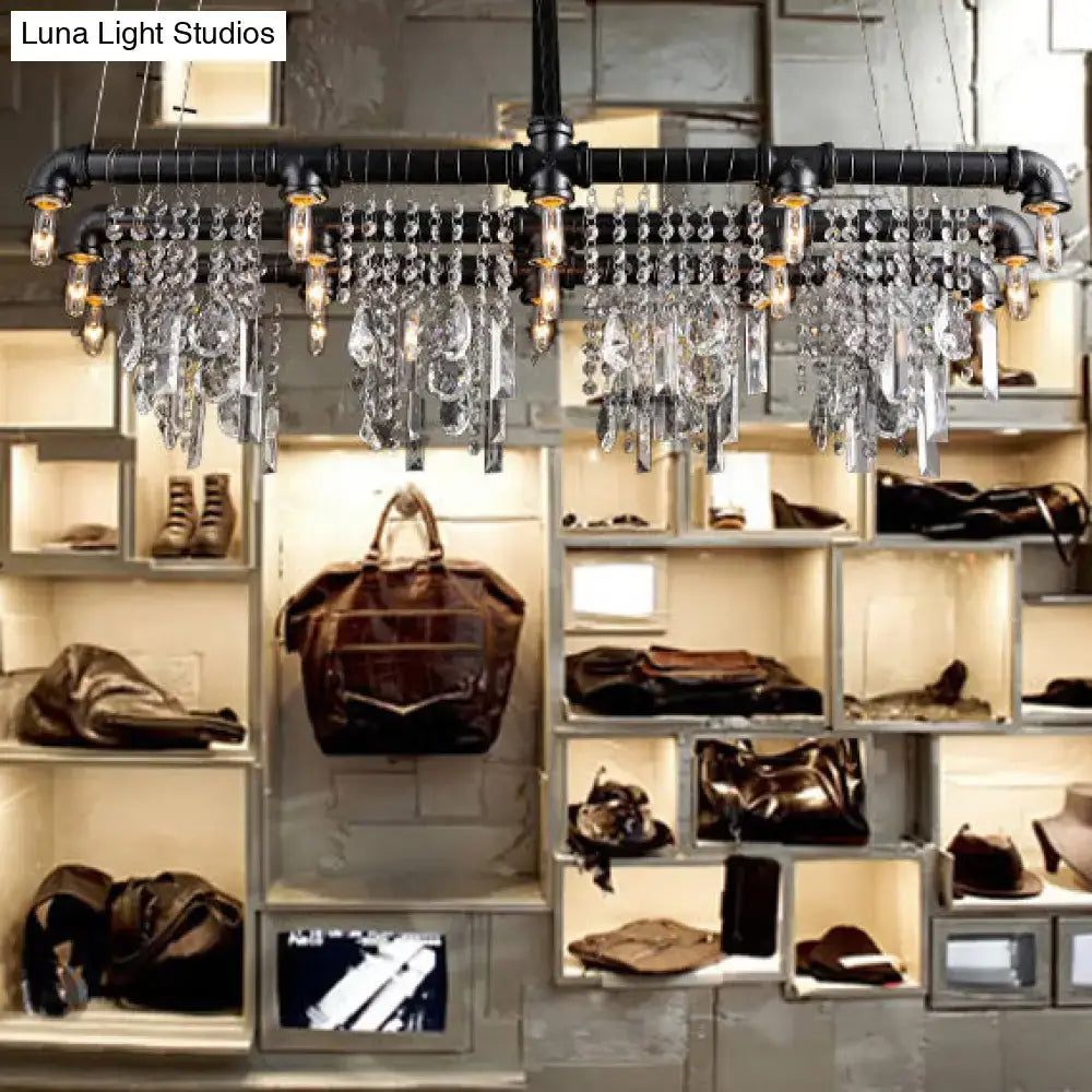 DecorBites™ 15-light black pipe chandelier features crystal droplets and exposed bulbs with adjustable fixture width and height