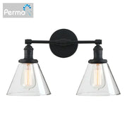 Black metal wall sconce with double cone glass industrial shades and exposed filament bulbs for bedroom lighting