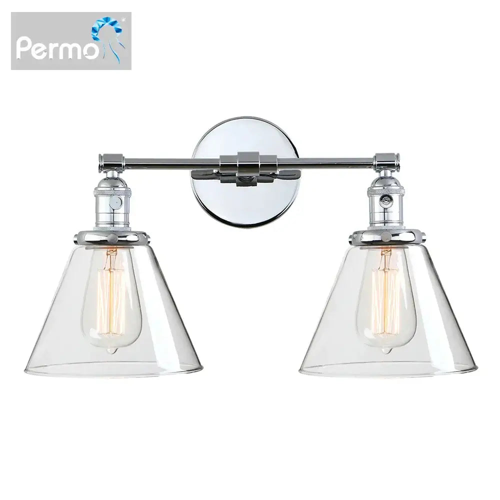 Chrome-finished wall sconce with double cone glass shades and exposed Edison bulbs for industrial bedroom lighting
