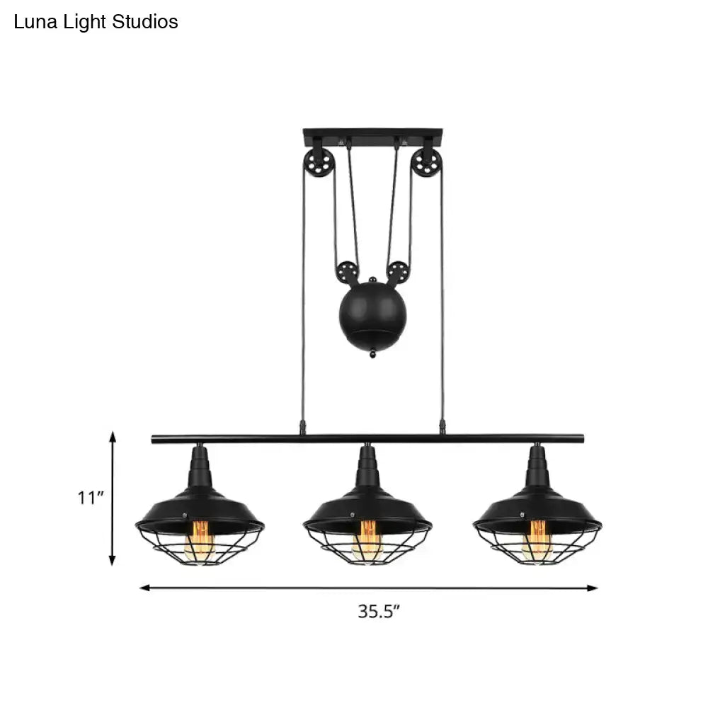 Black industrial farmhouse barn island pendant with three metallic cage shades and adjustable chain cord length pulley system