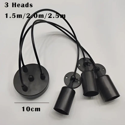 Industrial black finish pendant light with three cylindrical light sources and adjustable cords for dining room use