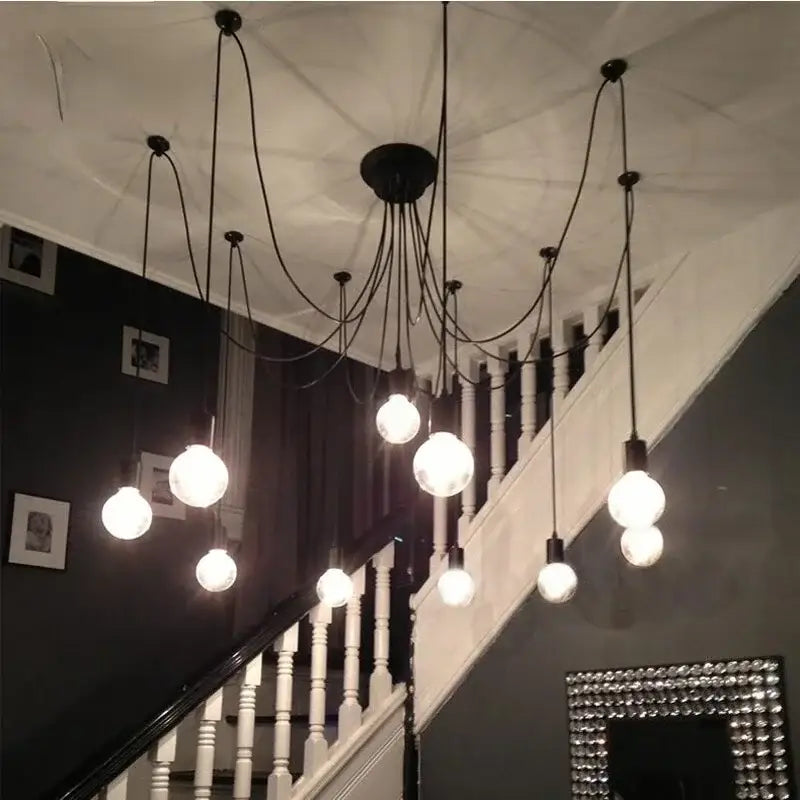 Industrial black finish 6 light pendant light chandelier with multiple exposed light sources and thick cord suspension