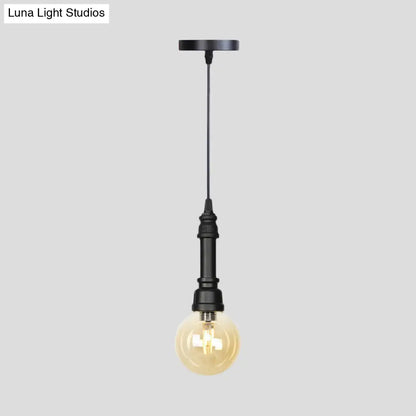 Industrial Black Finish Amber Glass Pendant Lamp with Pipe Suspension - 1-Light Ball/Capsule Ceiling Light