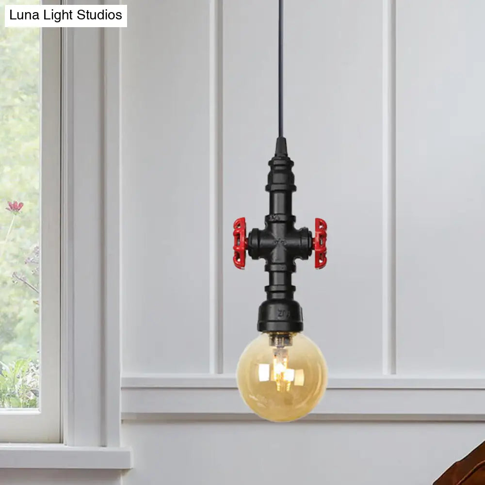 Industrial Black Finish Amber Glass Pendant Lamp with Pipe Suspension - 1-Light Ball/Capsule Ceiling Light