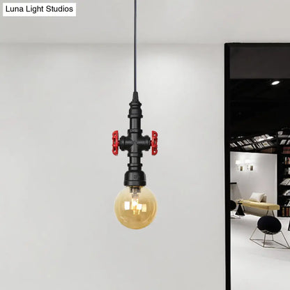 Industrial Black Finish Amber Glass Pendant Lamp with Pipe Suspension - 1-Light Ball/Capsule Ceiling Light