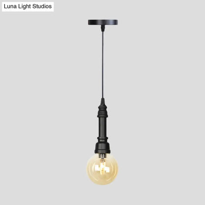 Industrial Black Finish Amber Glass Pendant Lamp with Pipe Suspension - 1-Light Ball/Capsule Ceiling Light