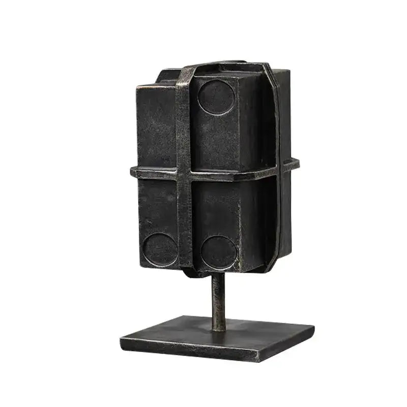 Industrial black geometric block binding metal bookends with dark metallic vintage microphone sculpture design