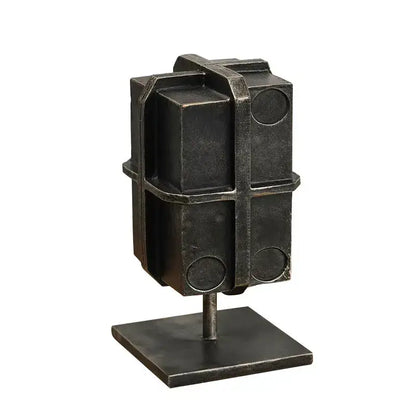 Dark metallic geometric block binding metal bookends with circular cutouts for industrial living room decor