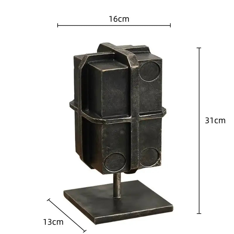 Industrial black geometric block binding metal bookends with dark metallic sculpture and circular cutouts for living room use