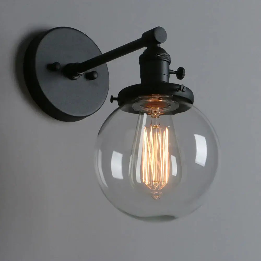 Black metal glass canopy wall sconce with clear globe and filament bulb for industrial glass canopy decorbites lighting