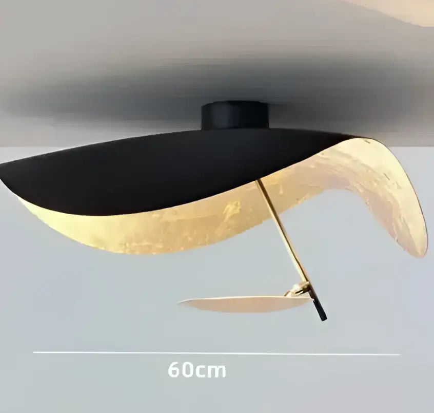 Industrial black and gold lotus leaf pendant light with sleek modern design ideal for dining room decorbites lederam manta