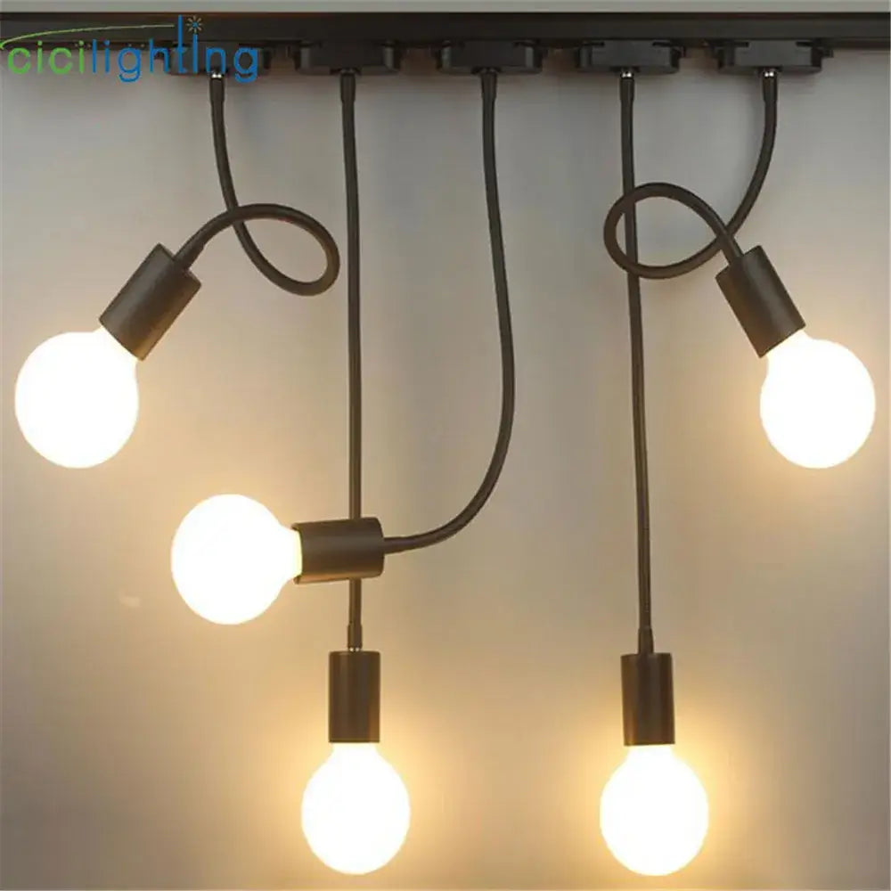 Industrial black gooseneck track lighting fixture with five exposed bulbs and flexible arms for clothing store decorbites industrial gooseneck track