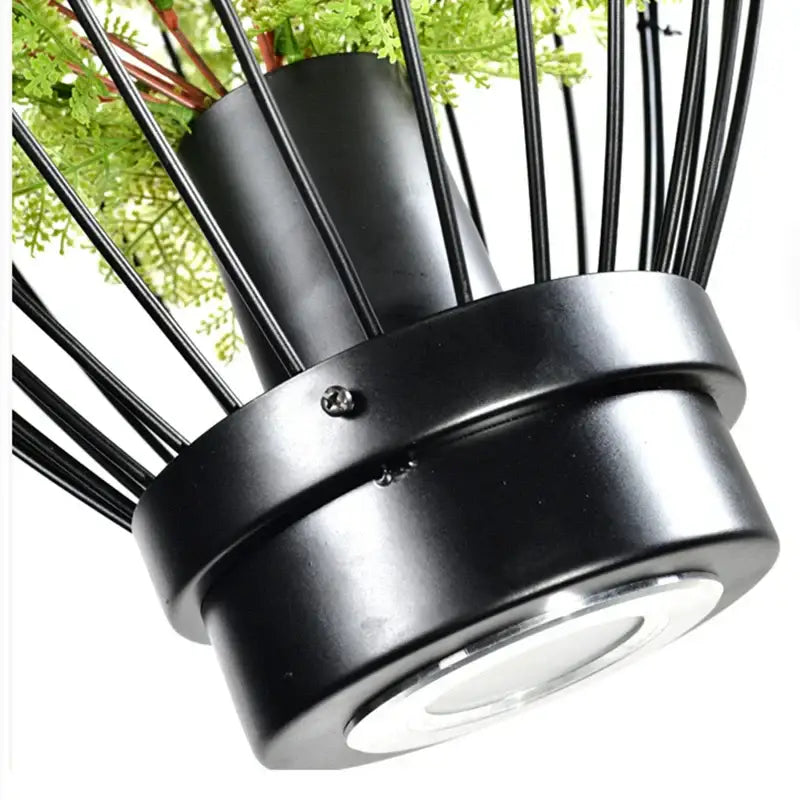 Industrial black metal wire hanging planter with cylindrical base and green foliage for decorbites green planting chandelier