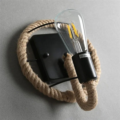 Industrial black hemp rope wall lamp featuring a clear glass filament bulb for stylish living room decorbites hemp rope wall accent