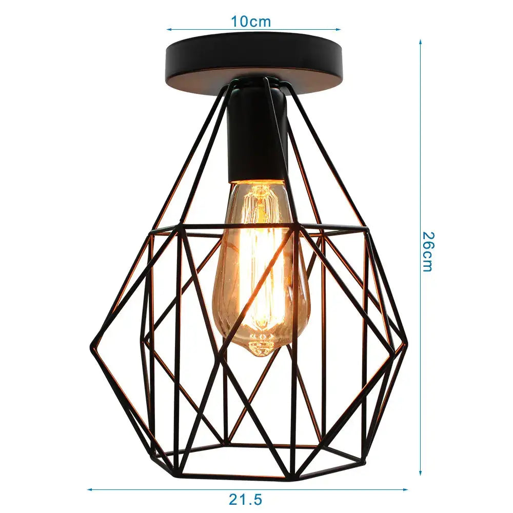 Industrial black iron aisle ceiling lamp featuring a black geometric wire cage and a glowing amber filament bulb by decorbites iron aisle