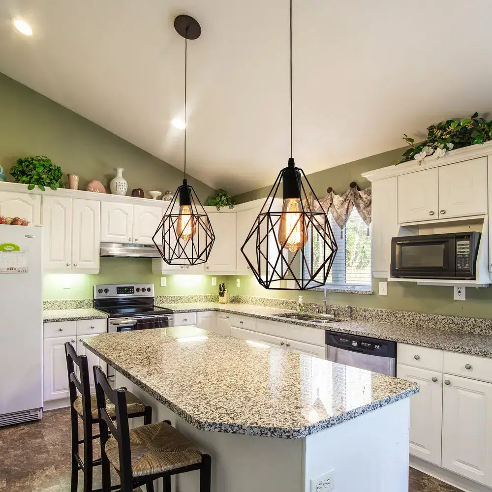 Two black iron cage chandelier pendant lights hang above kitchen island as industrial decorbites ceiling light