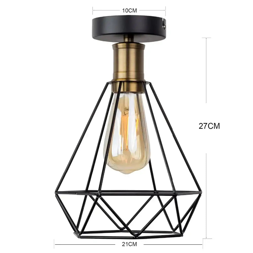 Industrial black iron cage led ceiling light with brass stem and exposed edison bulb for dining room decorbites iron cage