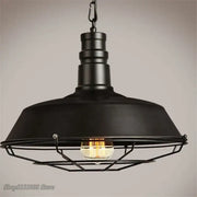 Black industrial iron pendant light with matte dome and wire cage housing exposed bulb for dining room decorbites iron pendant lights
