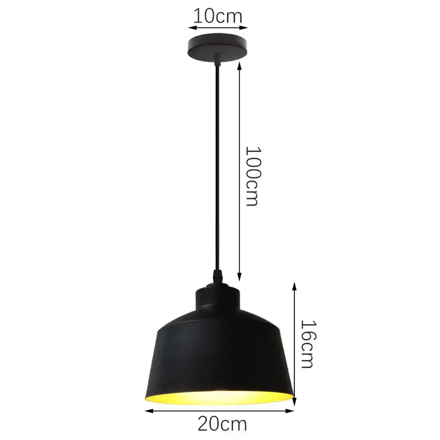Black industrial iron pendant light with matte finish and warm yellow interior glow for kitchen decorbites industrial iron pendant lights