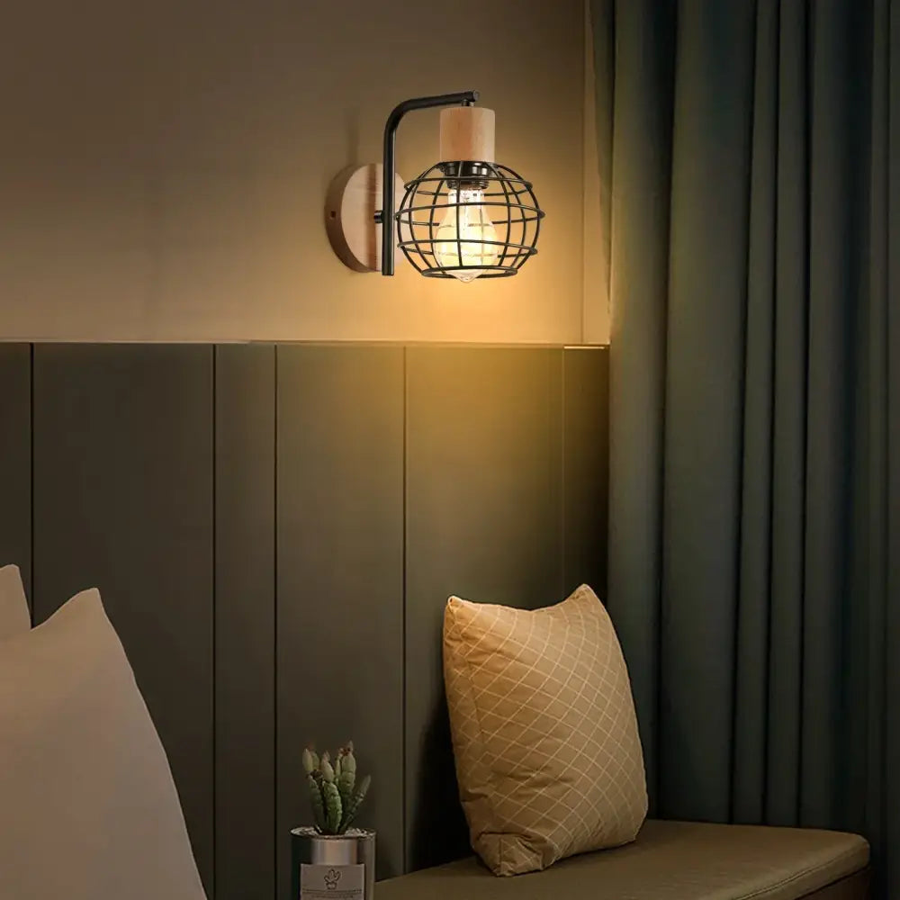 Industrial black iron wood wall lamp with black metal cage and warm bulb for bedroom decorbites iron wood wall sconce
