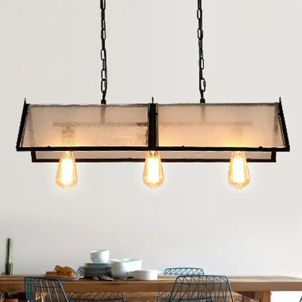 Decorbites classic black island lamp with black metal frame frosted glass panels and three exposed bulbs hanging from chains