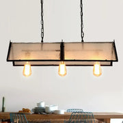 Decorbites classic black island lamp with black metal frame frosted glass panels and three exposed bulbs hanging from chains