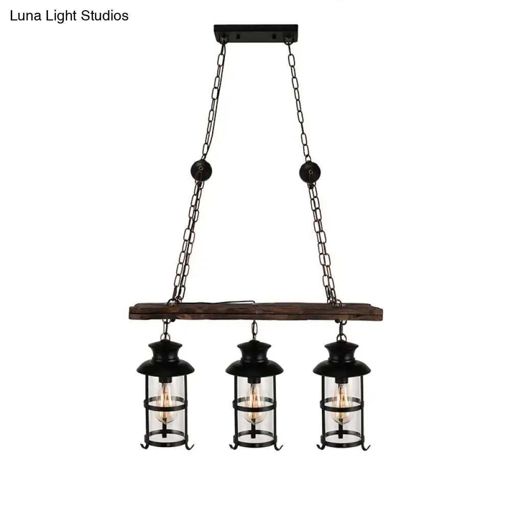 DecorBites industrial black wrought iron pendant light with clear glass bulbs and wood decoration hanging from beam