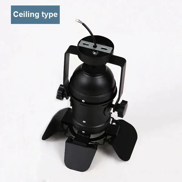 Black metal industrial loft dome track light with adjustable arms and three leaf-shaped shades for restaurant decorbites loft dome