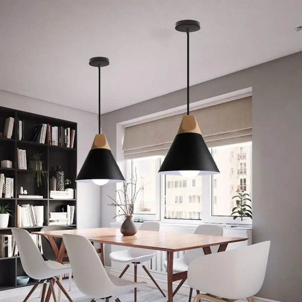 Black matte aluminum industrial aluminium pendant light with wooden accents hanging above a dining table decorbites industrial aluminium pendant