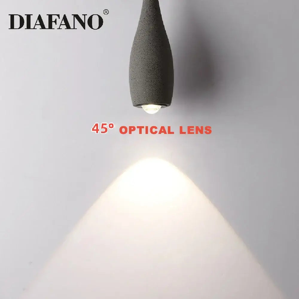 Industrial black matte cement pendant light with gray textured diafano shade and 45° optical lens for focused illumination