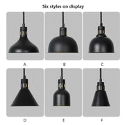 Industrial black matte electric food heating pendant light with flexible cords and metallic accents for kitchen use