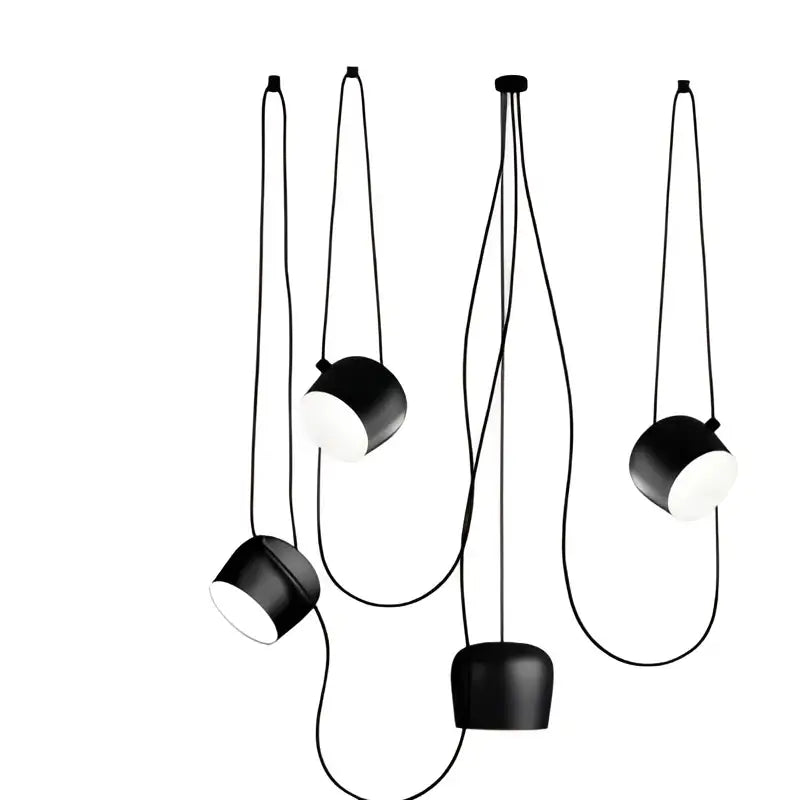 Industrial black matte spider pendant lamp with black cylindrical shades and white interiors for dining room decorbites industrial spider