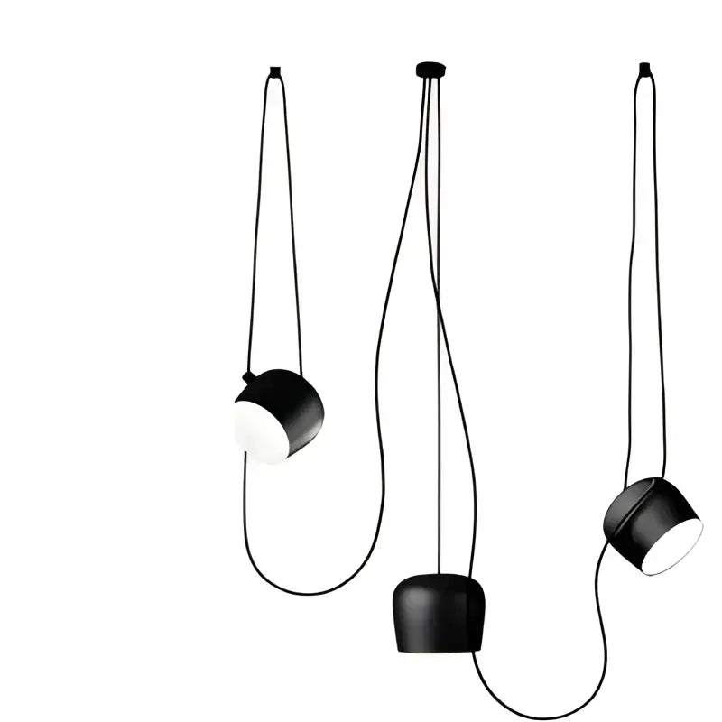 Industrial black matte spider pendant lamp with cylindrical design and exposed cords for modern dining room decorbites industrial spider