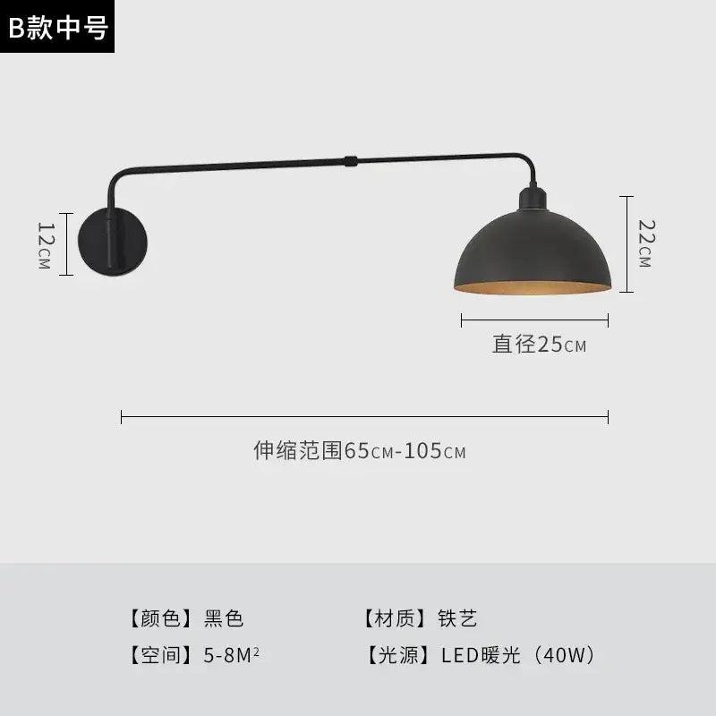 Black wrought iron wall lamp with matte finish and warm led lighting featuring an industrial telescopic swing arm