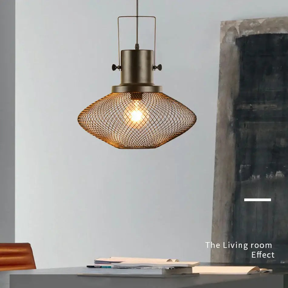 Industrial black mesh cage pendant light with bronze metal frame featuring diamond-patterned wire mesh shade for dining room decorbites cage pendant
