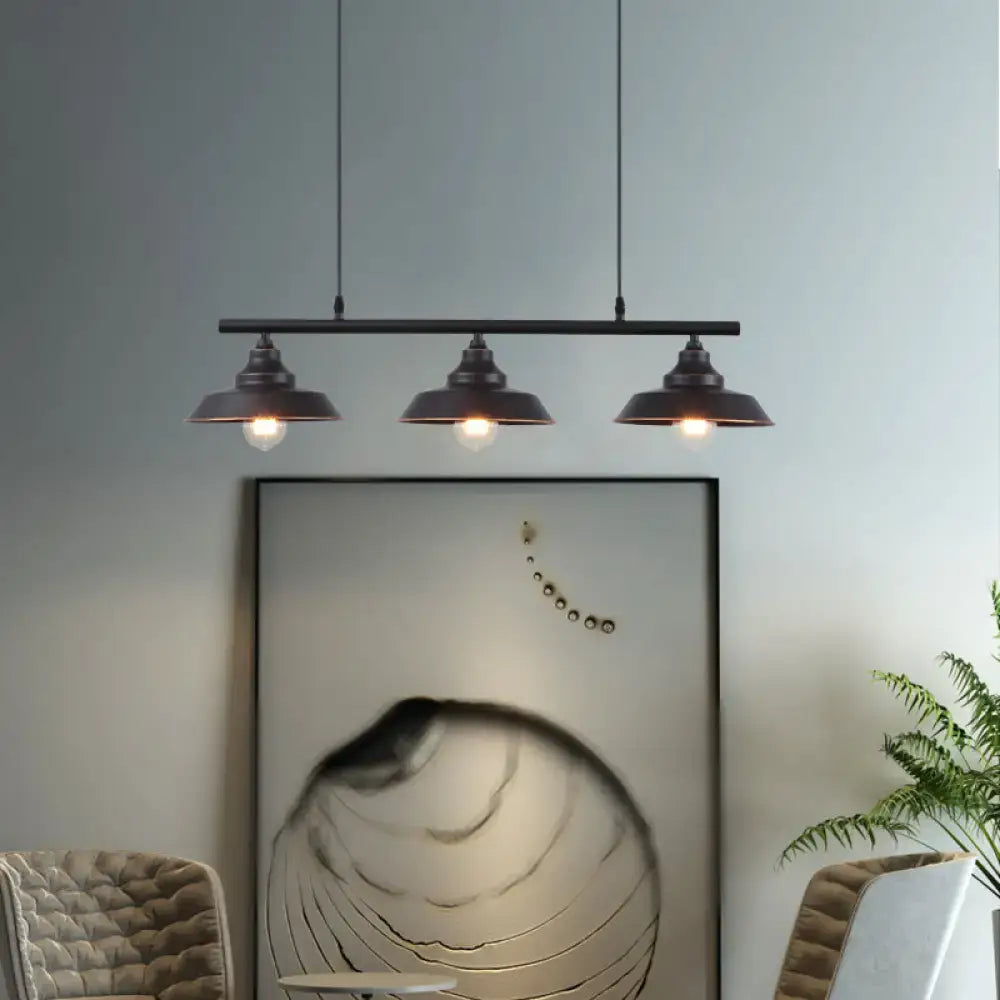 Black industrial metal pendant light with three dome shades and chain cord length for dining room chandelier use