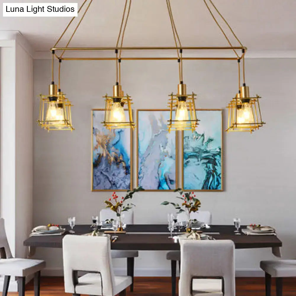 Gold-toned industrial style island pendant light with geometric cage design and exposed bulbs by decorbites