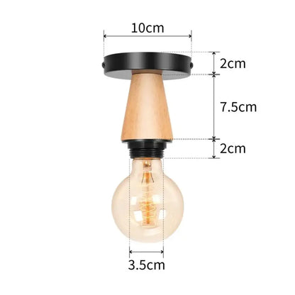 A rustic industrial led ceiling light with black metal cage, wooden stem, and exposed filament bulb for decorbites decor