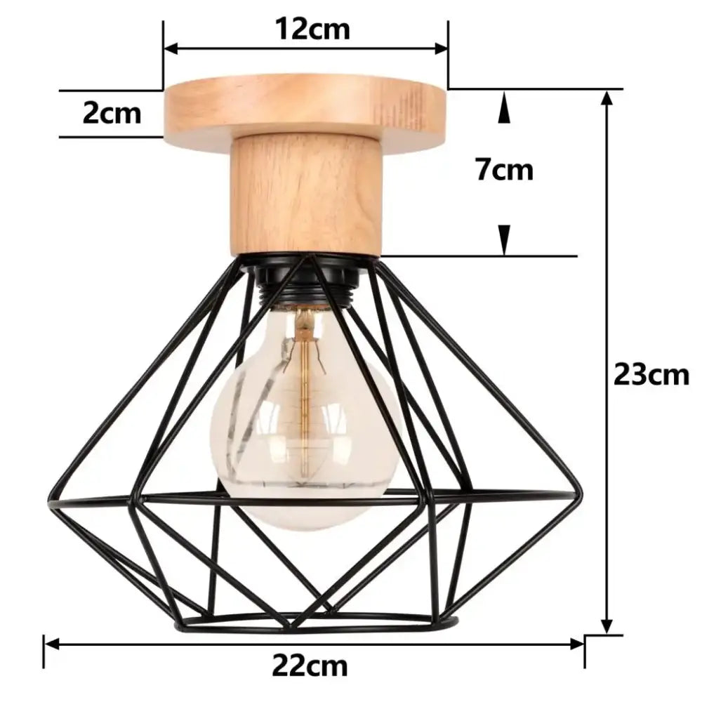 A rustic industrial led ceiling light with black metal cage and natural wood base featuring an exposed Edison bulb