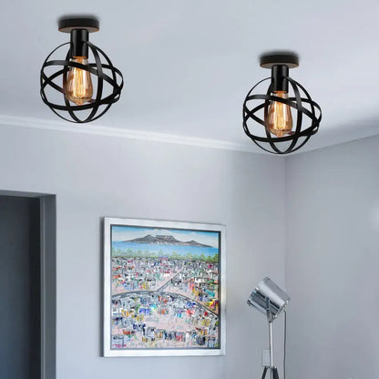Black wrought iron globe ceiling light with exposed filament bulbs for industrial led ceiling decorbites industrial led